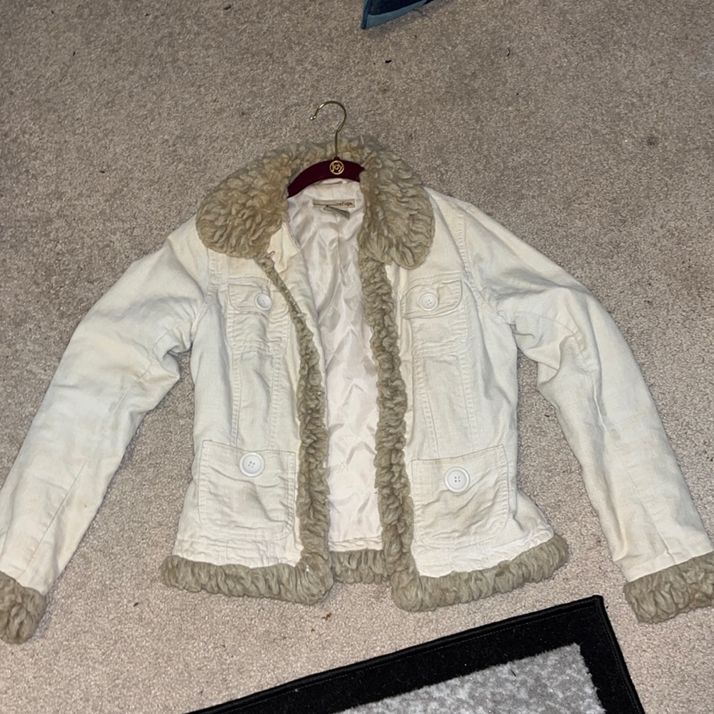 Will be washed. Worn once. Just hanging in closet. Size small